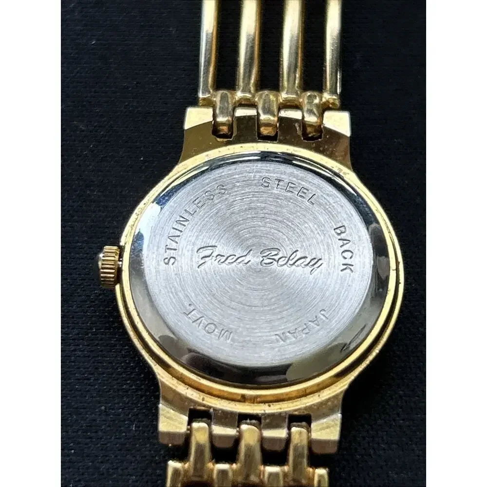 Fred Belay Gold Tone Silver Bezel Women’s Quartz Watch
